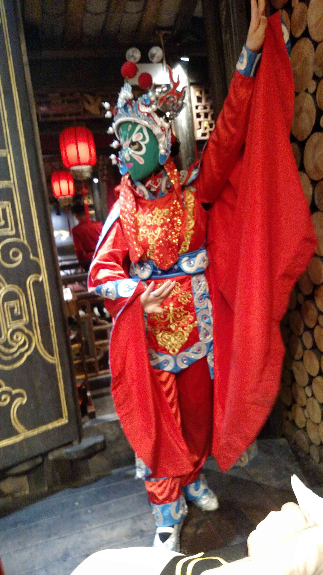 Traditional face-change dancer at hot-pot restaurant